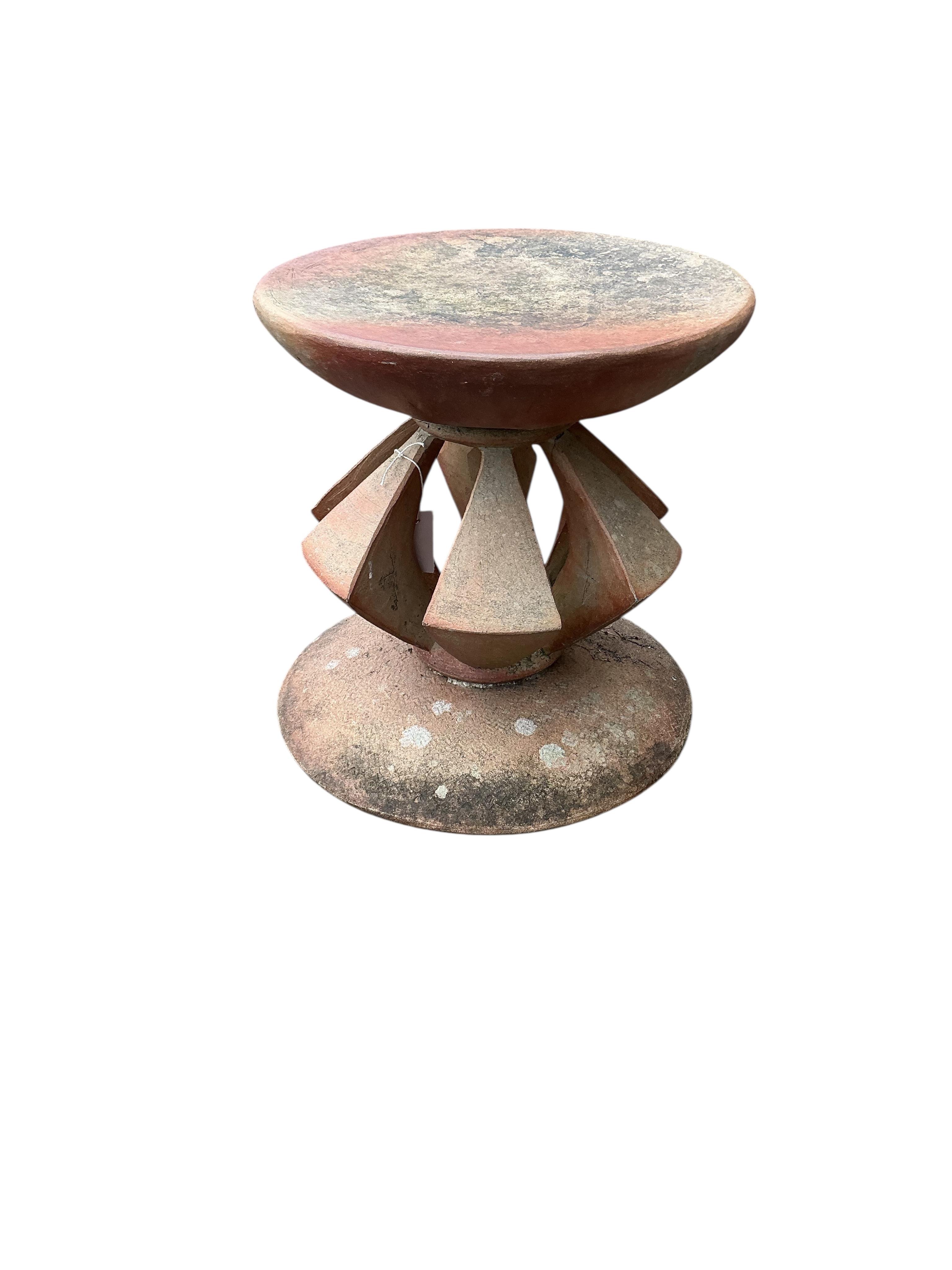 An earthenware garden sculpture or stand, height 46cm